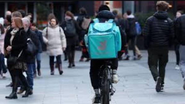 UK food delivery firms to crack down on irregular migrant workers