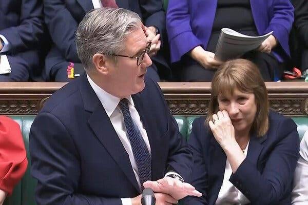 UK govt backs finance minister after tears in parliament