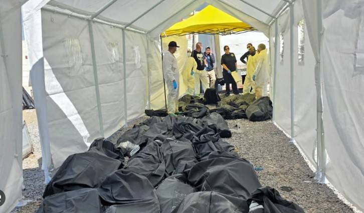 Mexico charges two men over 383 bodies found at crematorium