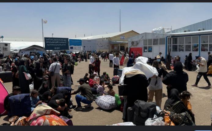 'Emergency' at Afghan border as migrant returns from Iran surge ahead of deadline