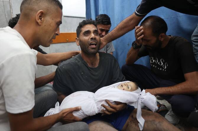 Gaza civil defence says 12 killed by Israeli forces