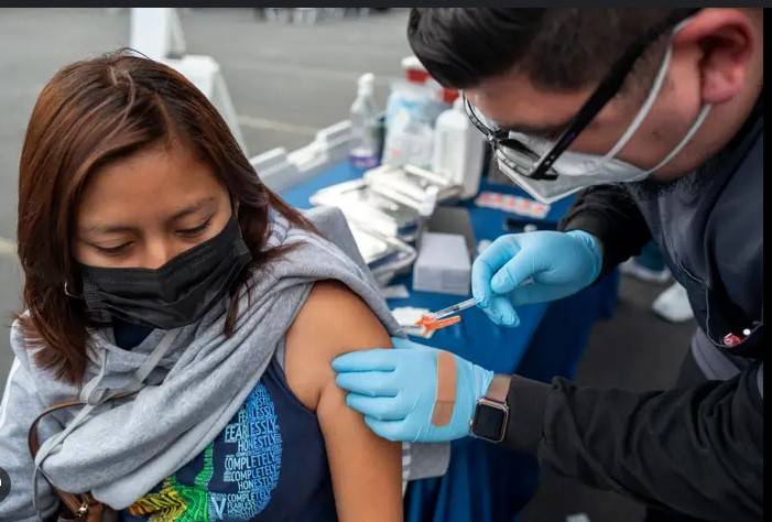 Medical groups sue US health secretary over Covid-19 vaccine change