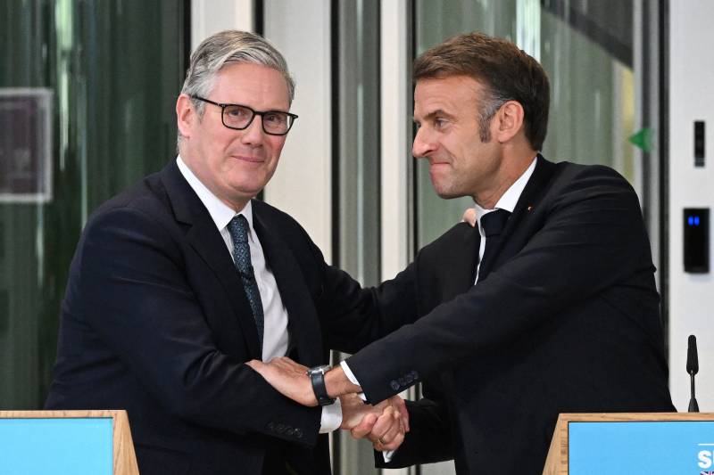 UK, France unveil migrants deal as Macron wraps up state visit
