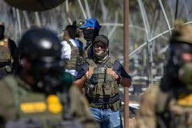 US officials defend immigration raid tactics