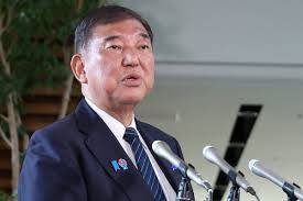 Polls suggest tough election for Japan PM