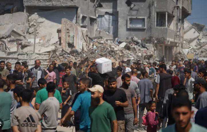 26 Palestinians killed as Israel bombs two aid centres in Gaza