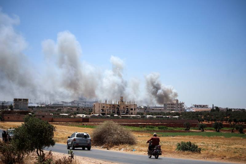 Syria arms depot blasts kill 12, wounds more than 100: monitor