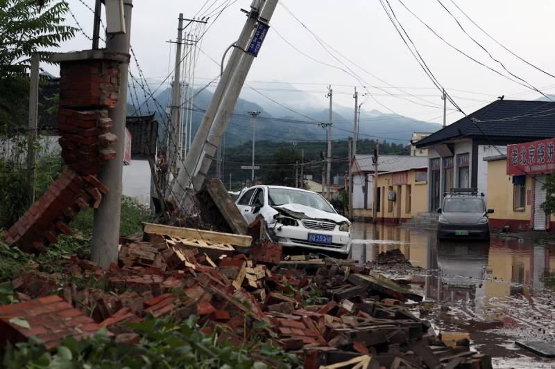 Landslide kills four as rains lash northern China
