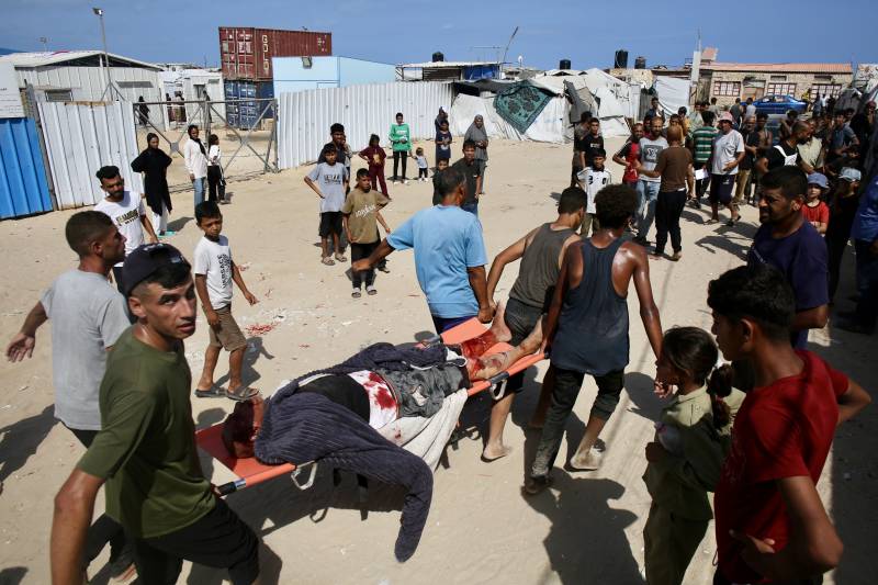 Gaza civil defence says 14 killed by Israeli forces