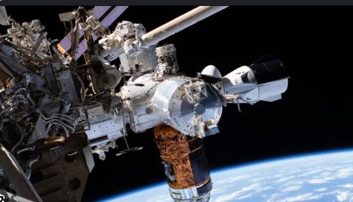 SpaceX Crew Dragon docks with International Space Station