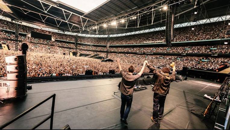 Man dies after falling at Oasis gig in London