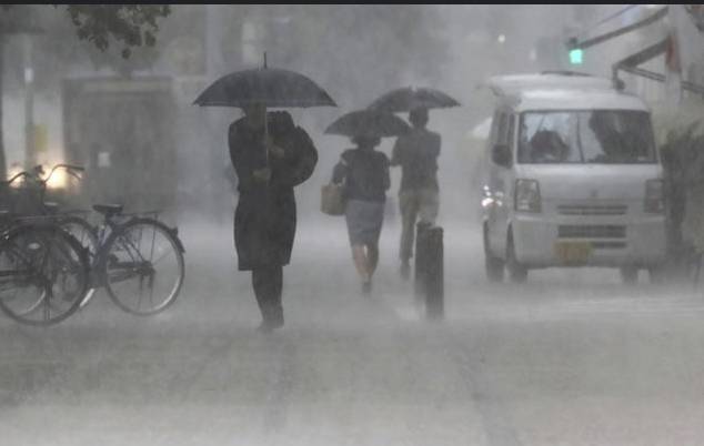 'Never seen before' rains lash southern Japan