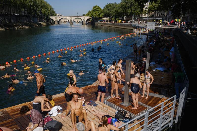 Parisians cool off in the Seine after century-old ban ended