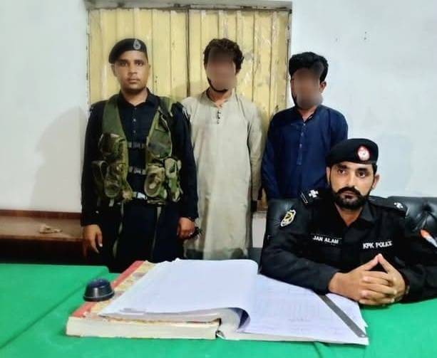 Two held attempting to steal equipment from helicopter wreckage in Peshawar