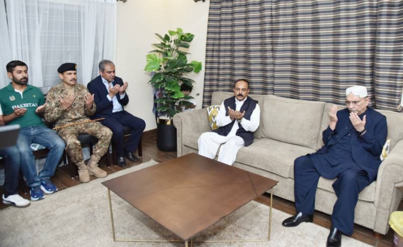 President visits residence of Major Rizwan Tahir Shaheed