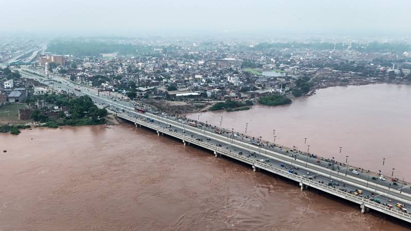 Smog then floods: Pakistani families 'can't catch a break'