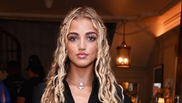 Princess defends family after posing with father Peter and stepmother 