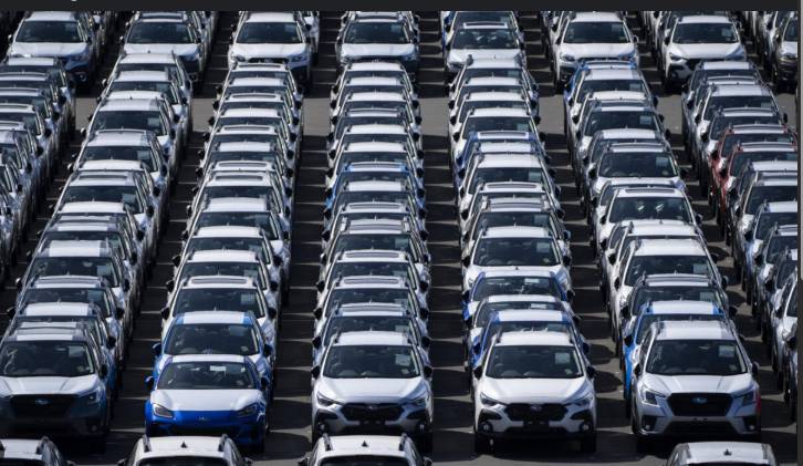 Trump signs order to lower US tariffs on Japan autos to 15%