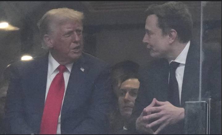 Trump and Musk sit side-by-side, months after messy split