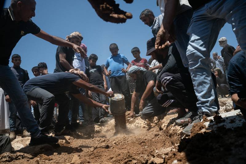 Palestinians bury young man they say was killed by settler