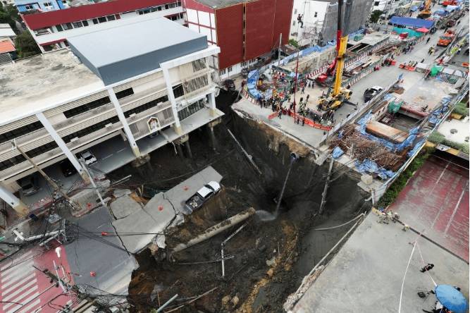 Massive sinkhole in Bangkok street forces evacuations