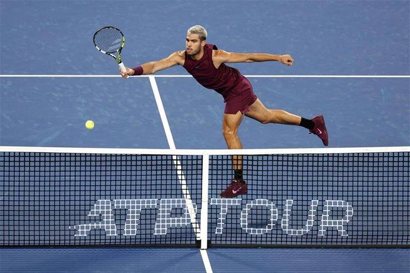 Alcaraz survives injury scare and rain delay to win Tokyo opener