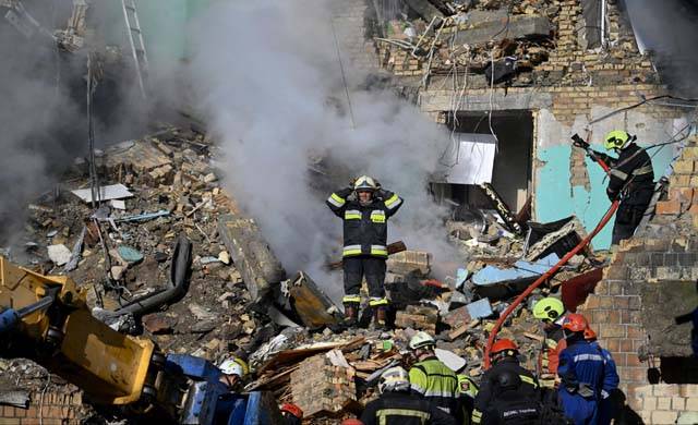 Russian missile and drone barrage kills four in Kyiv