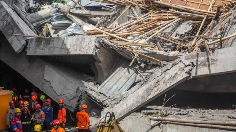 Dozens missing, three dead in Indonesia school collapse