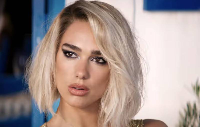 Dua Lipa brushes off injury fears as she returns to stage in Dallas