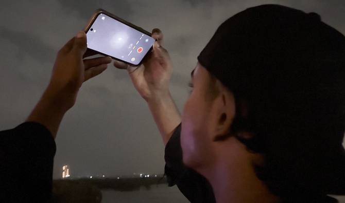 Harvest Supermoon illuminates night sky over Karachi