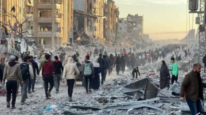 Palestinians return to devastated Gaza City as truce holds