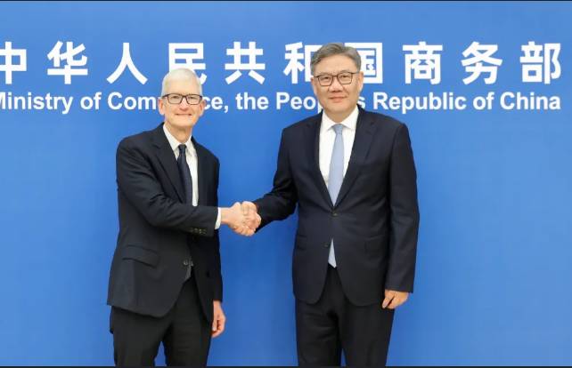 China urges 'equal dialogue' with US as Apple's Cook visits