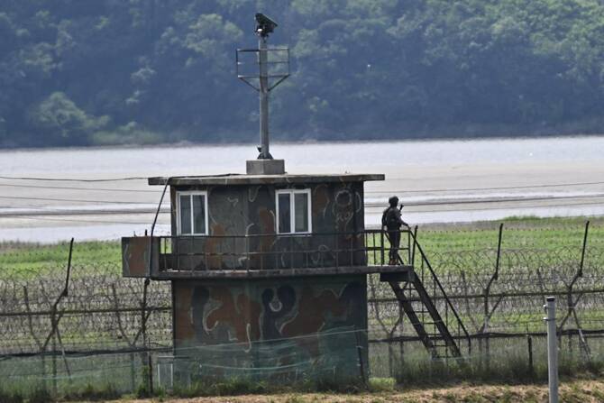 North Korean soldier held by Seoul after crossing land border