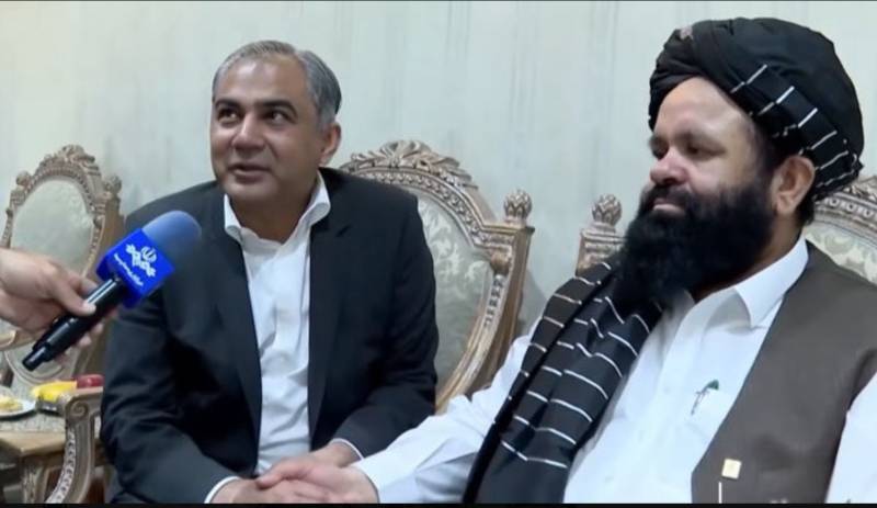 Pakistan, Afghan interior ministers shake hands in Tehran