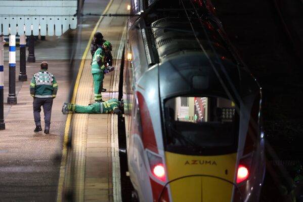 UK train stabbing wounds 10, two suspects arrested