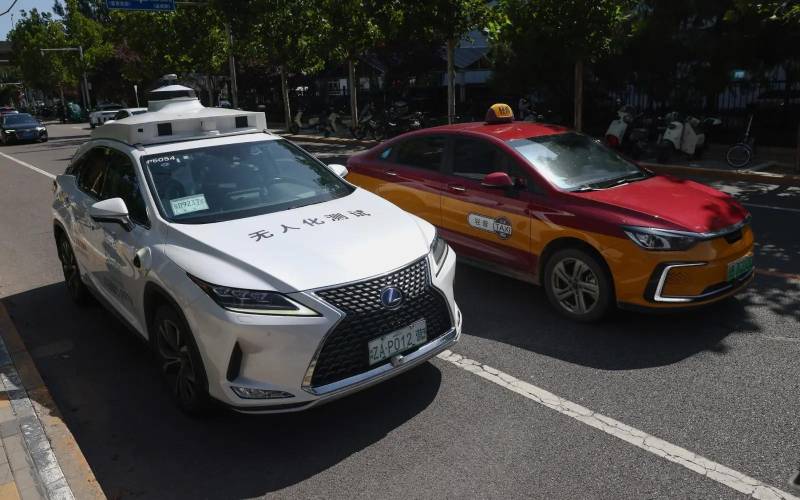 China's robotaxi firms sink on Hong Kong debut