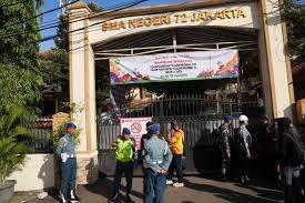 Blasts injure at least 20 on Indonesia school campus