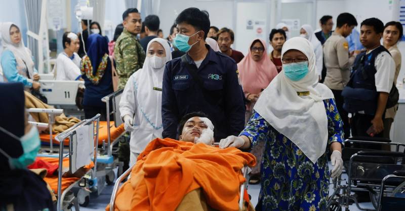 Indonesia probes student after nearly 100 hurt in school blasts