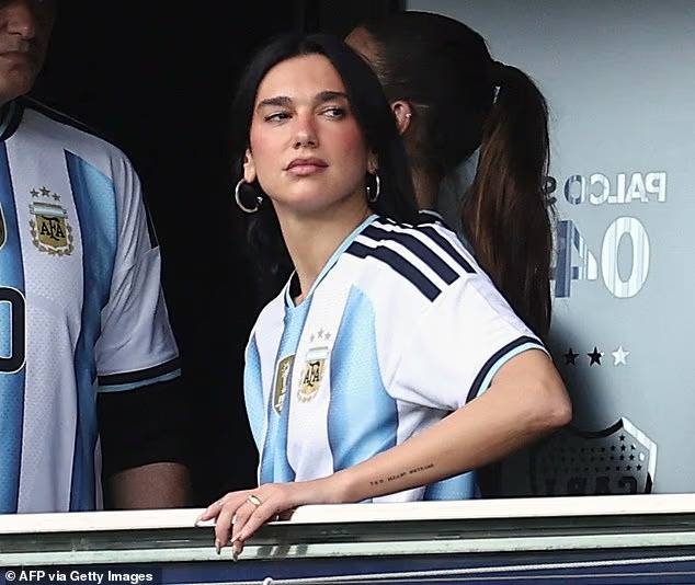 Dua Lipa swaps glitter for goals as she enjoys Argentine Superclasico 
