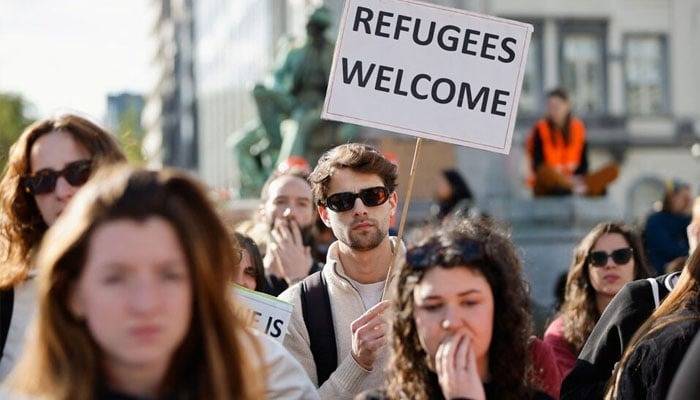 EU names four countries to get help redistributing migrants