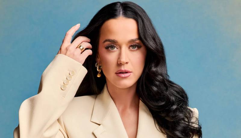 Katy Perry stuns in a metallic bodysuit as she lights up Madrid
