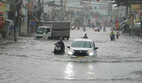 Vietnam flooding submerges homes, kills 16, after relentless rain