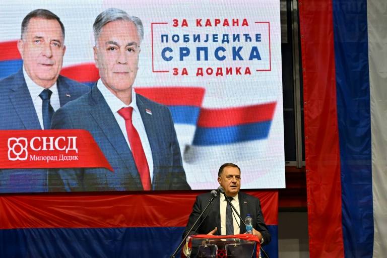 Bosnian Serbs hold snap poll to replace banned leader