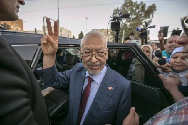 Tunisia court hands opposition figures decades in jail