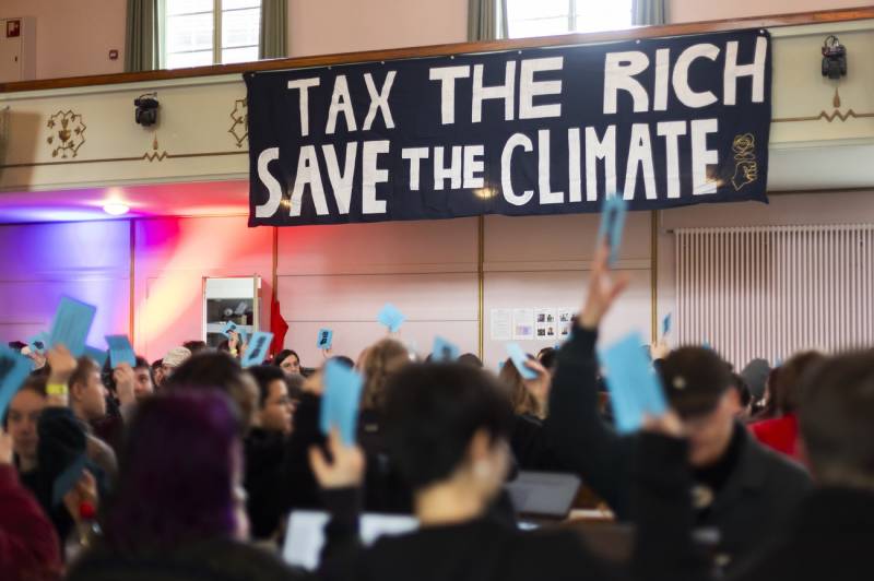Swiss reject compulsory civic duty, climate tax for super-rich: projections