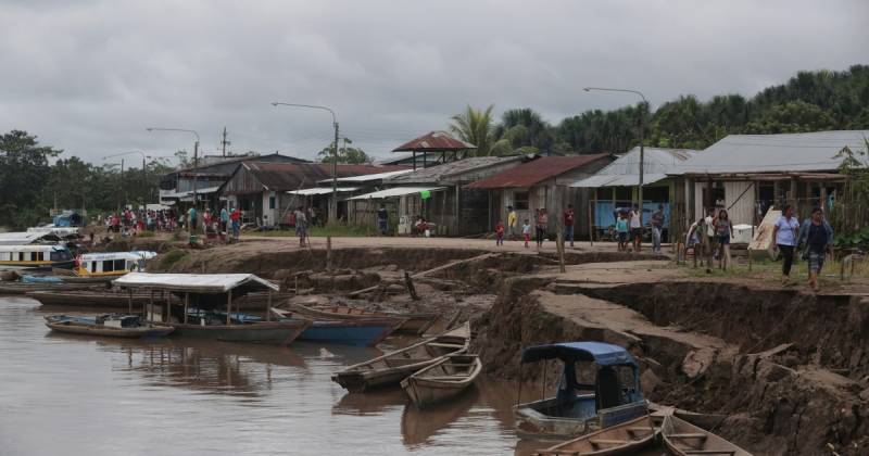 Twelve dead, dozens missing as landslide submerges boats in Peru port