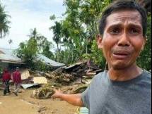 Race to get aid to Asia flood survivors as toll tops 1,200
