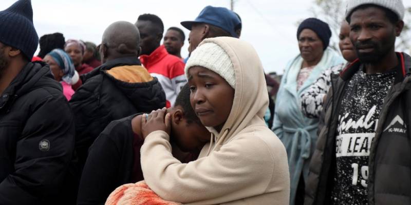 12 people, including 3 children, killed in South Africa hostel shooting