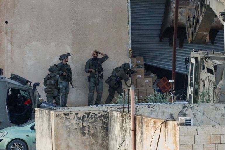 Israel army says killed two Palestinians after attempted ramming attack