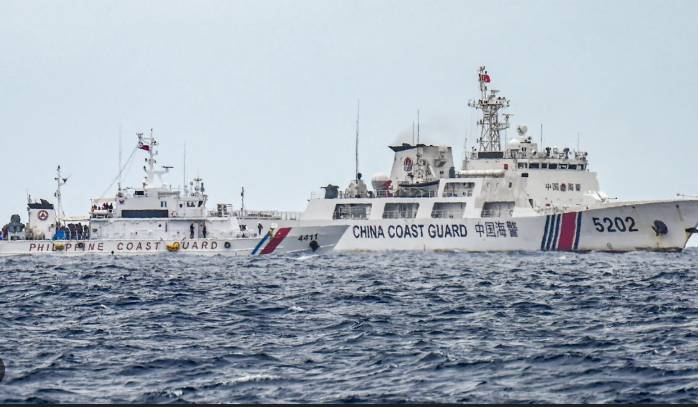 Philippines says fishermen injured in China Coast Guard encounter